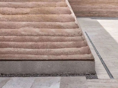 某主題公(gong)園(yuan)建築(zhu)用卓(zhuo)能達(da)土壤(rang)固化(hua)劑做夯土牆